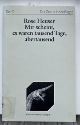 Graues Buchcover mit der Aufschrift „Rose Heuser. Mir scheint, es waren tausend Tage, abertausend“.