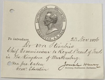 Handschriftlich ausgefülltes und unterschriebenes, leicht gelbliches Schriftstück mit einer kleinen Abbildung einer Büste.